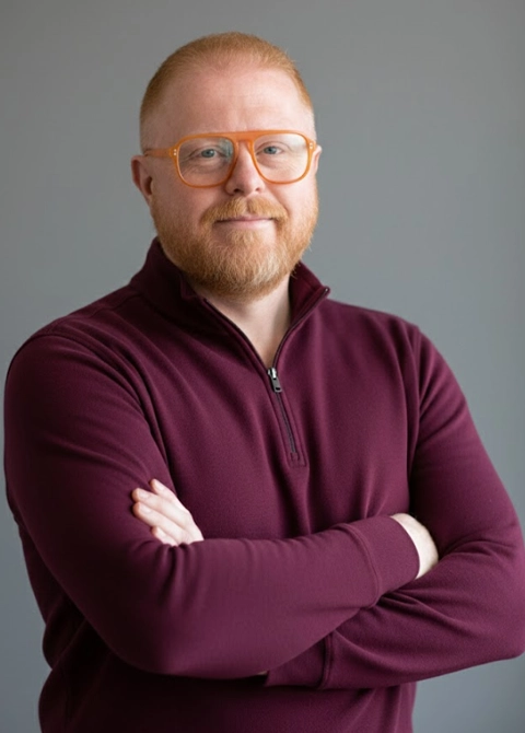 Chiropractor Anthony Davis In Red Sweater